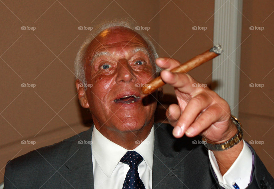 Man smoking cigar