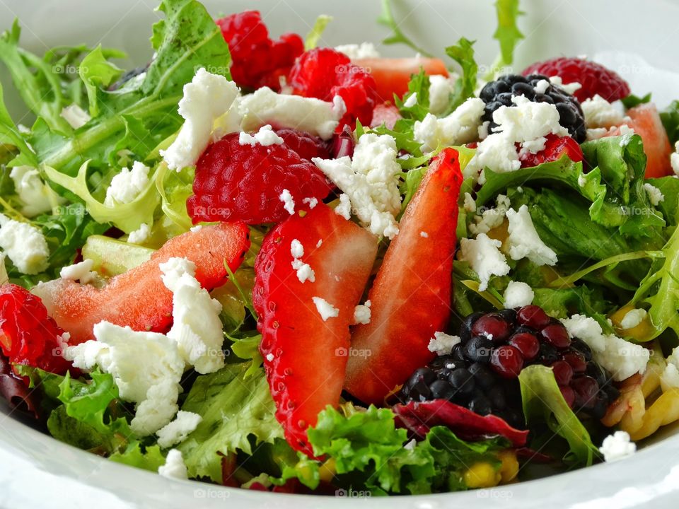 Fresh Green Salad. Fresh Green Summer Salad With Ripe Strawberries And Feta Cheese
