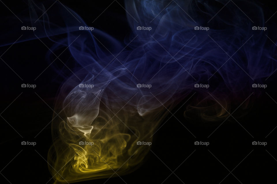 blue and yellow smoke abstract background