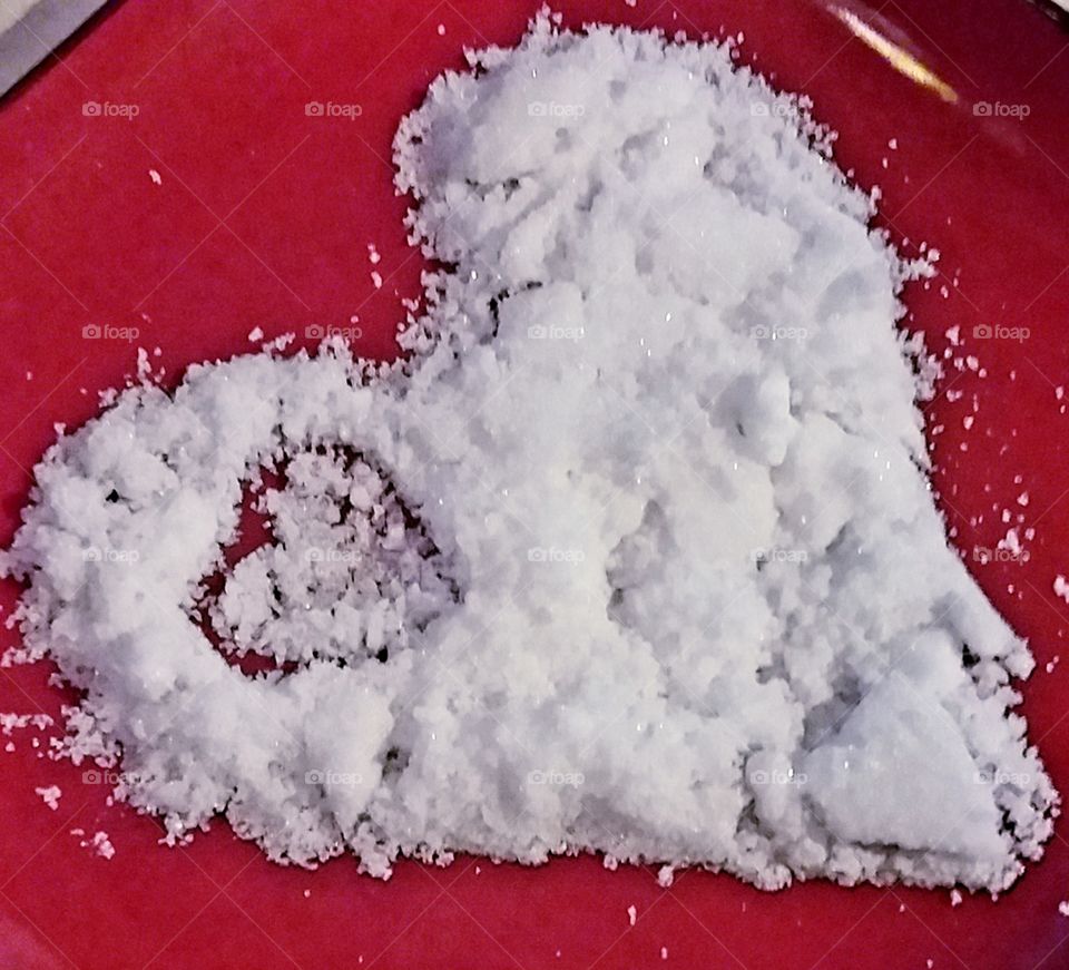 heart shape made of granulated sugar