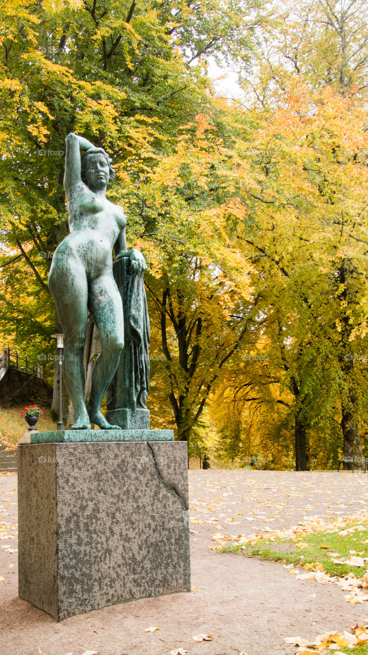 statue of Galatea in the park in Borås Sweden on an wet autumn day