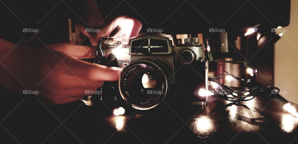 a camera surrounded by lights