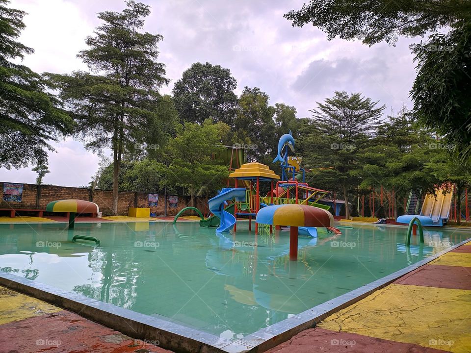 A swimming pool is an artificial construction designed to be filled with water and used for swimming, diving or other water activities