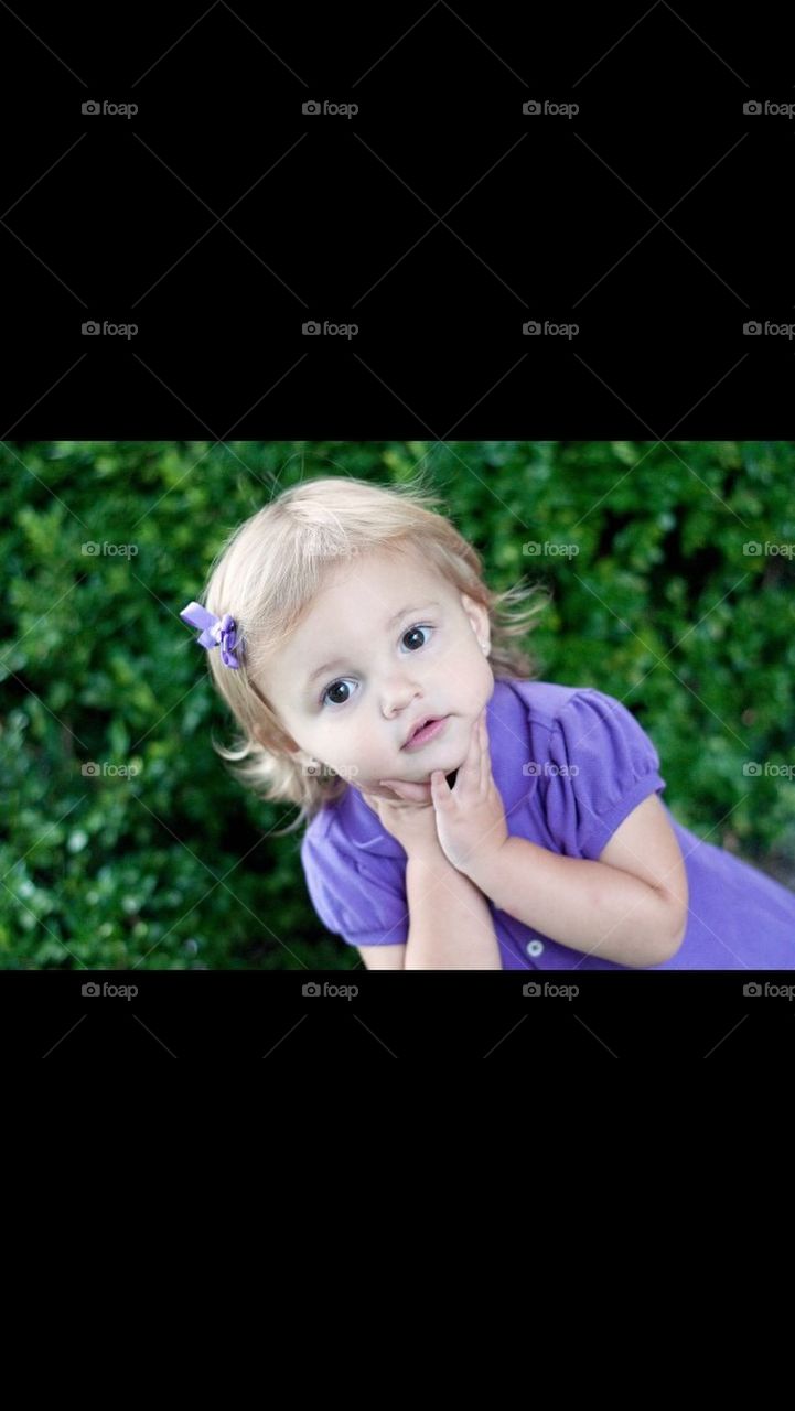 Little girl in purple dress