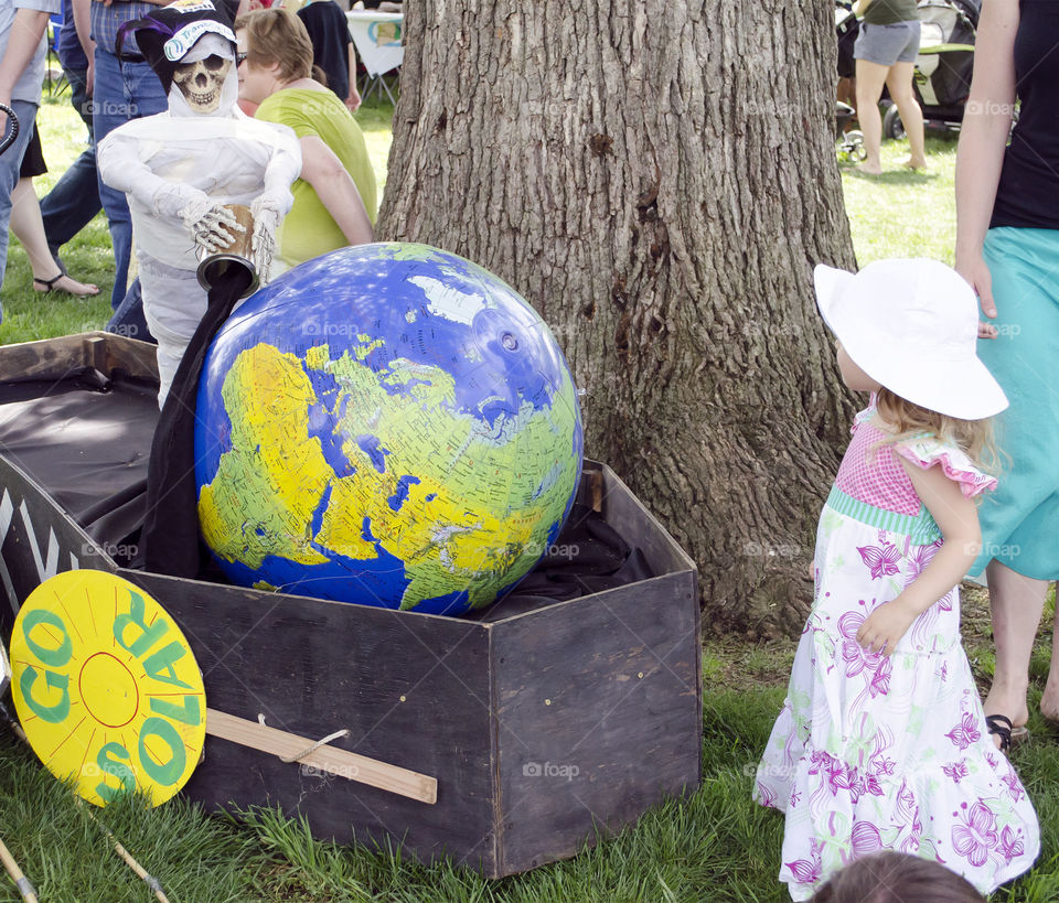little girl enjoying spring earth day . fun in the sun