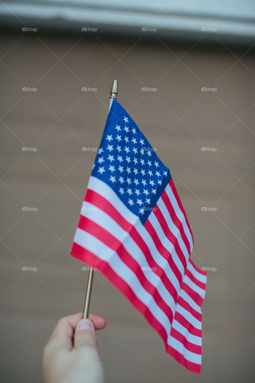 American flag in hand 