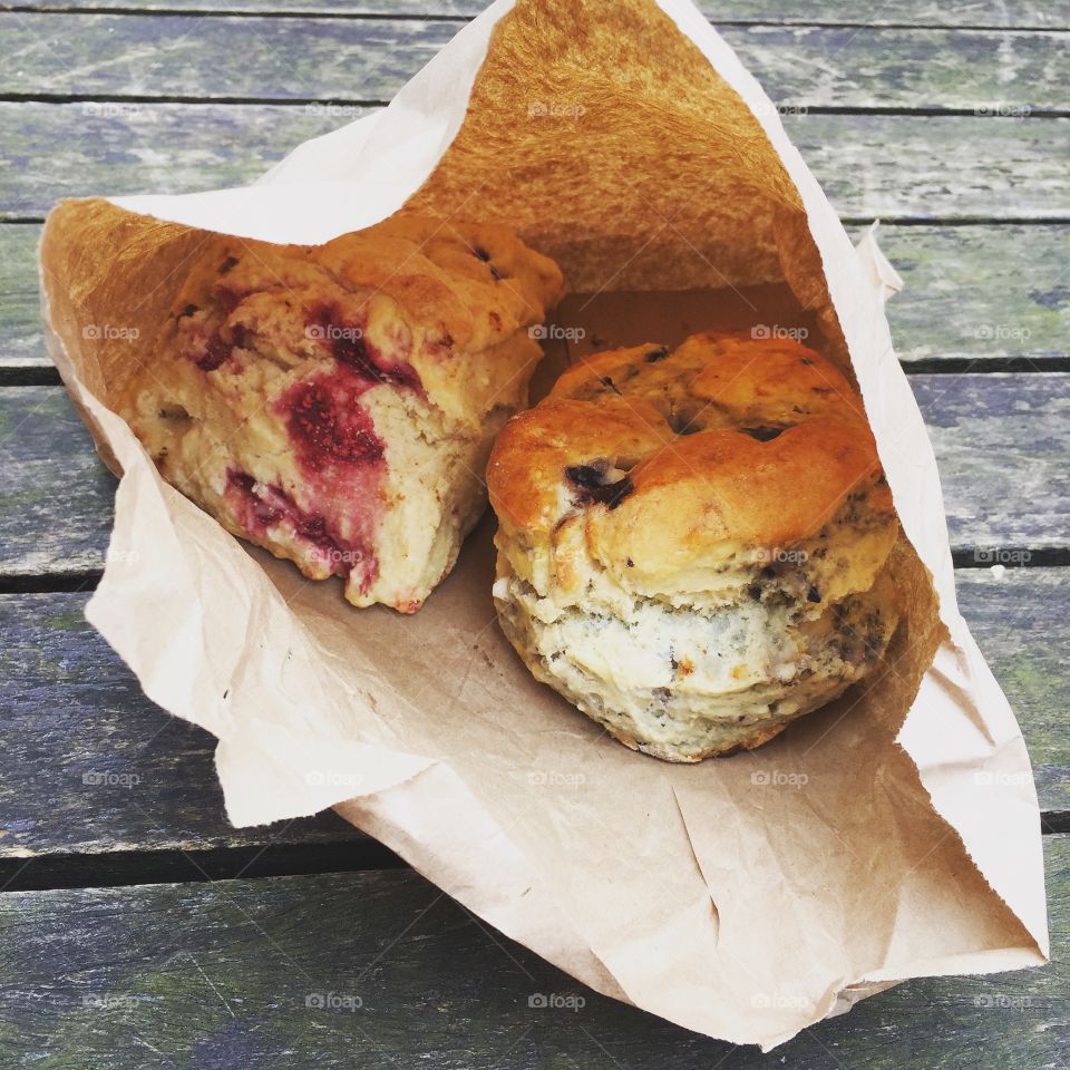 Bag of scones on plank table