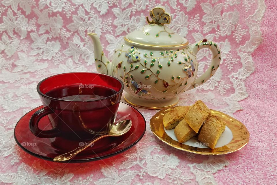 pink tea in red teacup