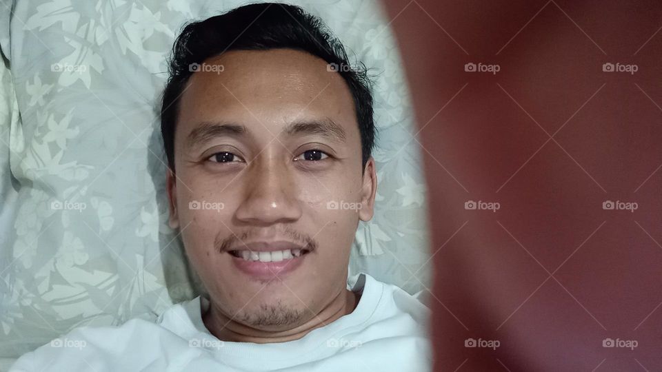 Close-up of an asian man's face