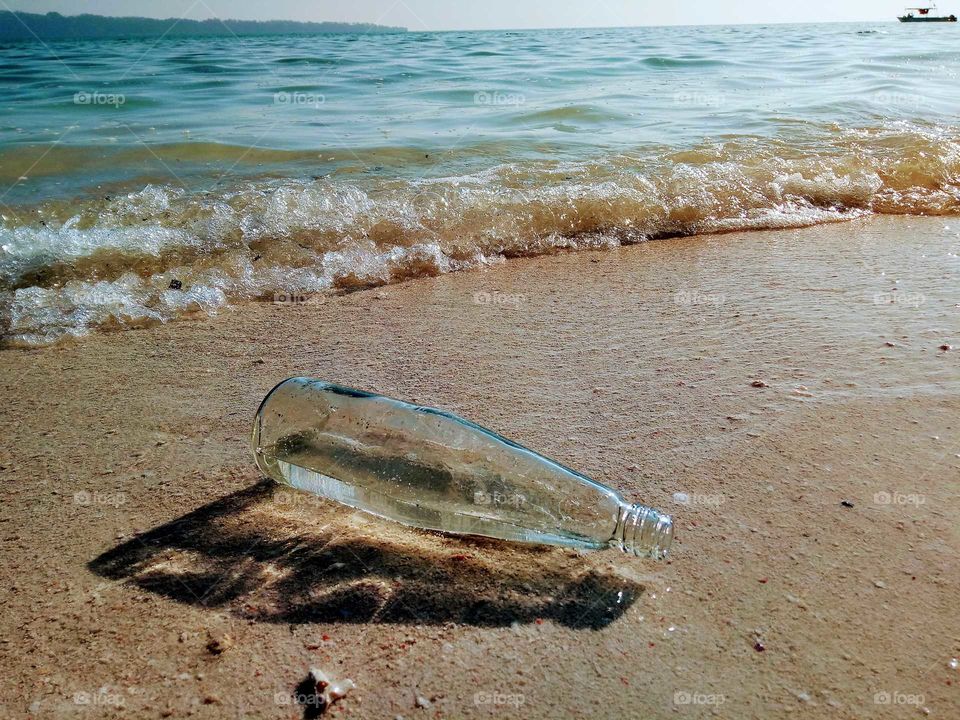 bear bottel at beach