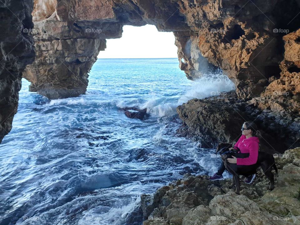 Sea#cave#waves#human#dog