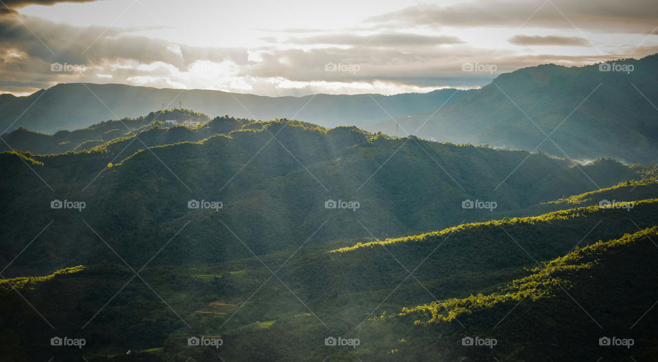 Beautiful light of dawn creating wonderful shadows over the mountains.