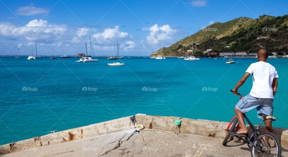 Boy On Bike At The End Of A Pier, Boy Looking Into The Ocean, Pondering Boy, Island Views, Bicycling Boy, St. Maarten Grand Case 