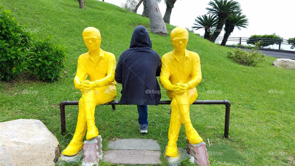 Yellow man sculpture