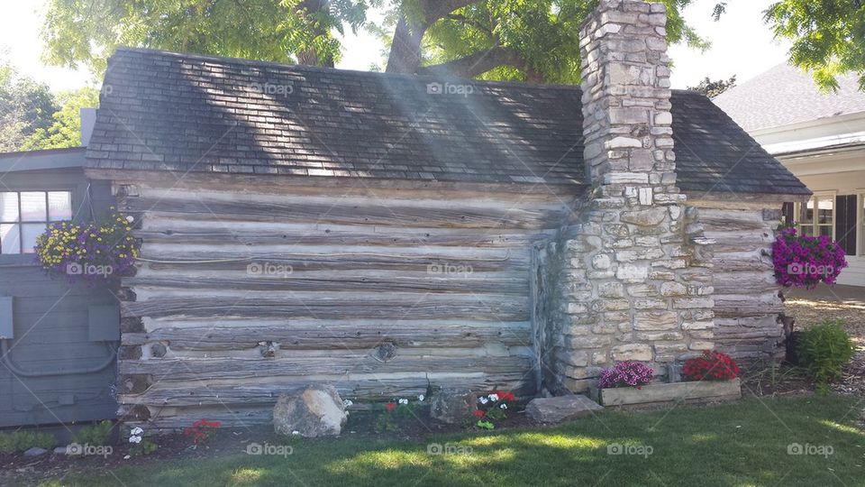 log cabin with sun