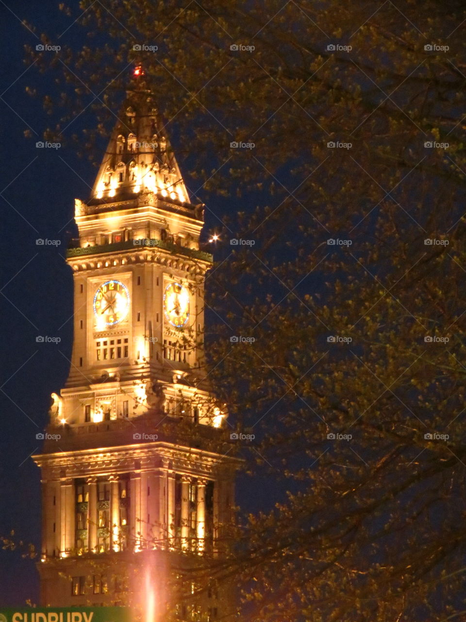 illuminated clock tower in downtown Boston
