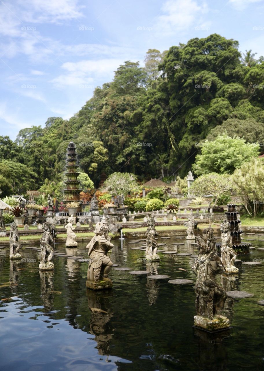 Views at a beautiful Hindu water temple in Bali, Indonesia at midday. 