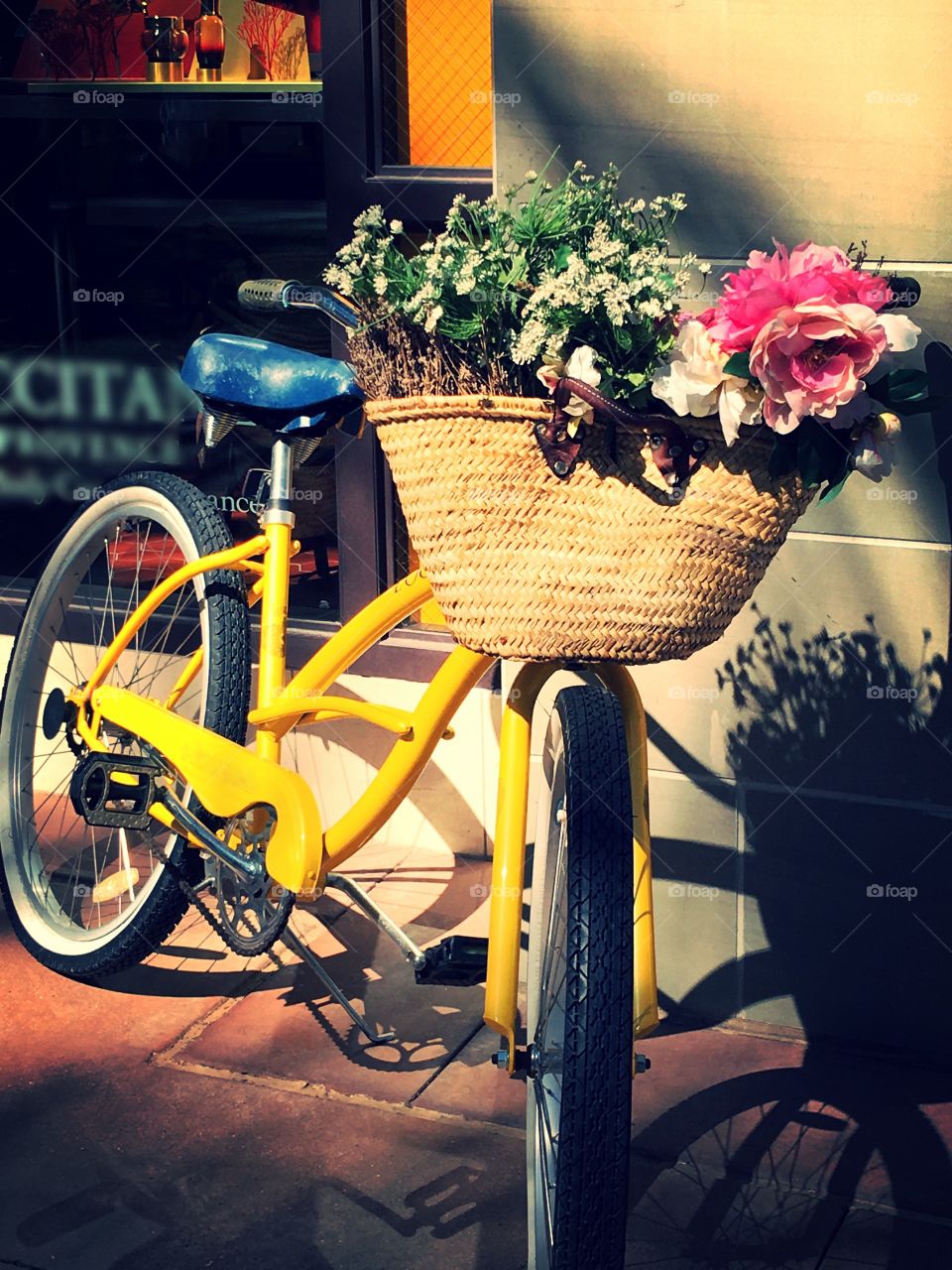 City Cruiser Parked in Front of Store.