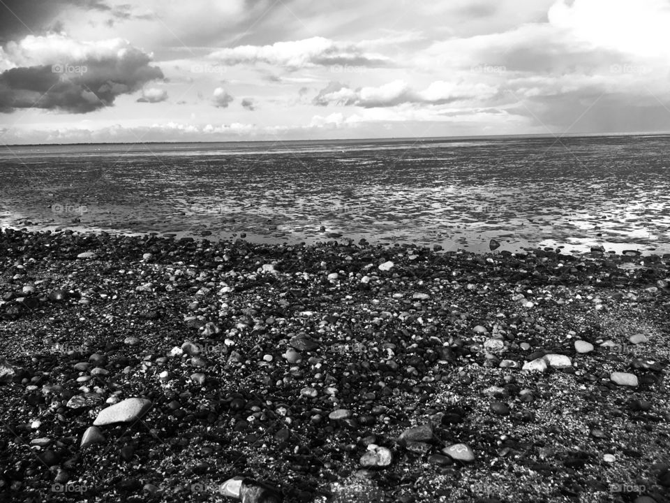 I sometimes love a photo of a beach in black and white. I feel it adds a timeless element which is how I feel when I go to the beach - that the sea will continue long after I’m gone. I feel small and comforted at the same time.