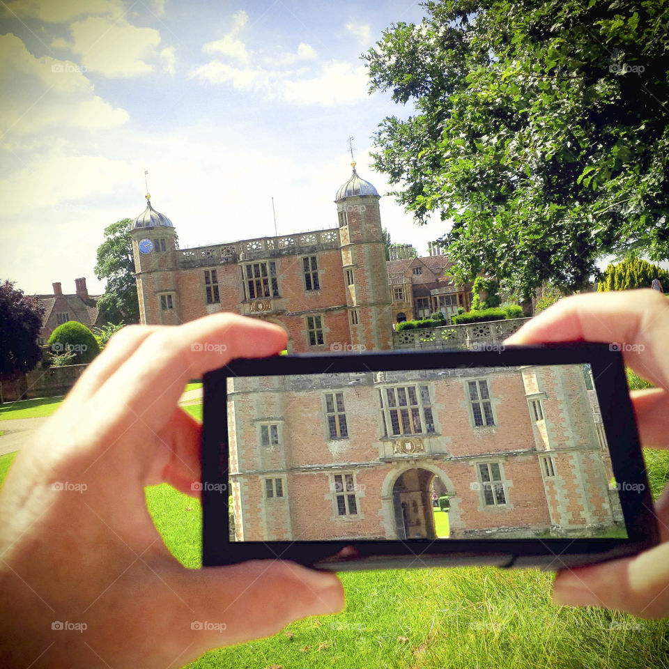 Phone. Camera phoneTourist taking a picture with a smartphone cell phone mobile phone camera 