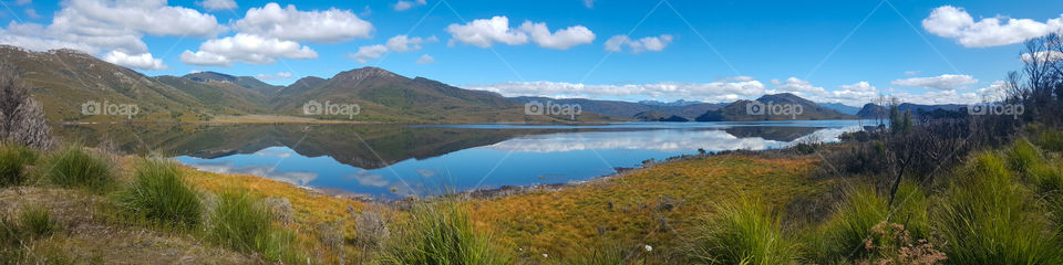 Reflections on Lake Pedder, Tasmania, on a calm autumn day.