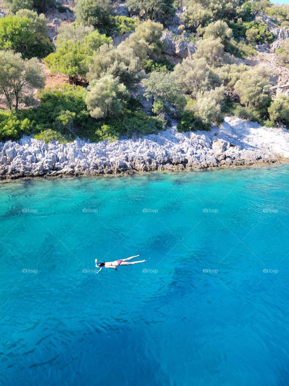 Swimming in crystal clear turquoise water