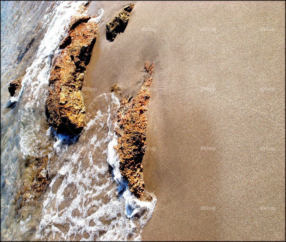 Waves and sea rocks close up shoot colorful background summer feeling positive mood holidays season Creta island Greece amazing seascape