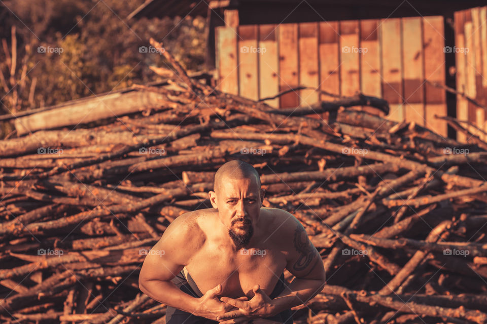 One person doing workout at outdoor on countryside background. Healthy lifestyle.