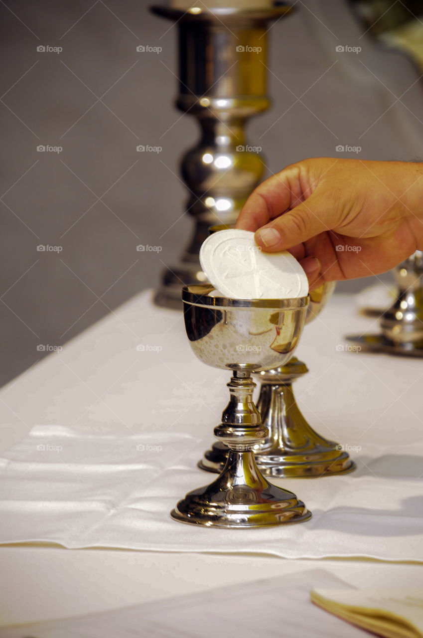 Calyx Cup golden Hand ostia priest