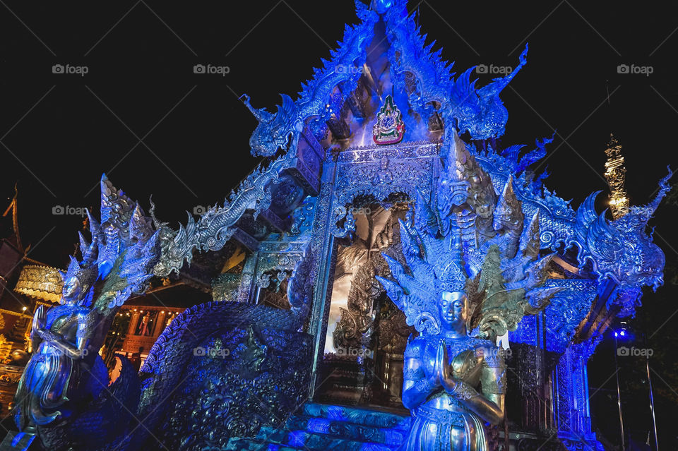 Wat Sri Suphan (The Silver Temple) bathed in blue light, Chiang Mai 