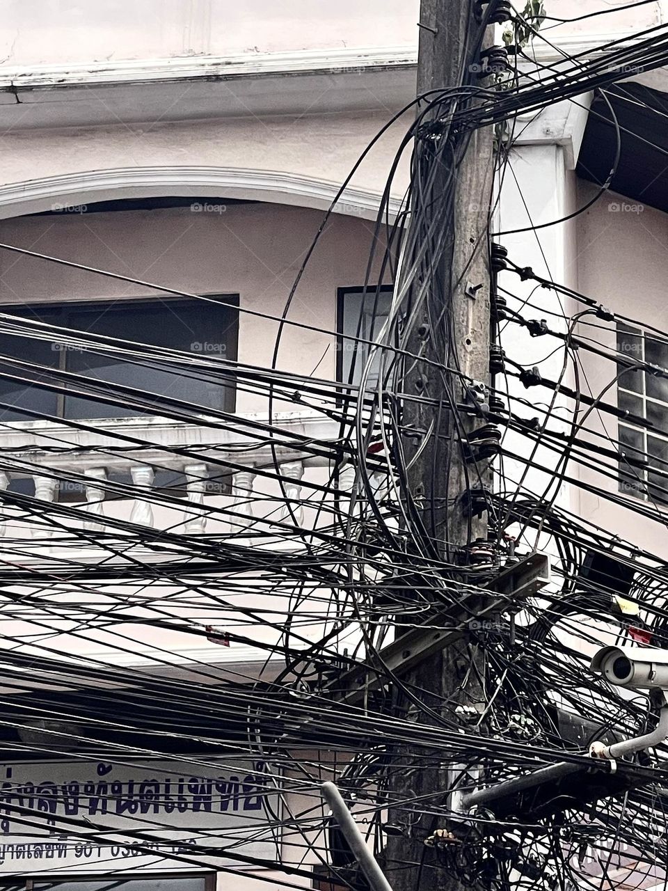 View of an electrical lines on an electrical pole in Thailand 