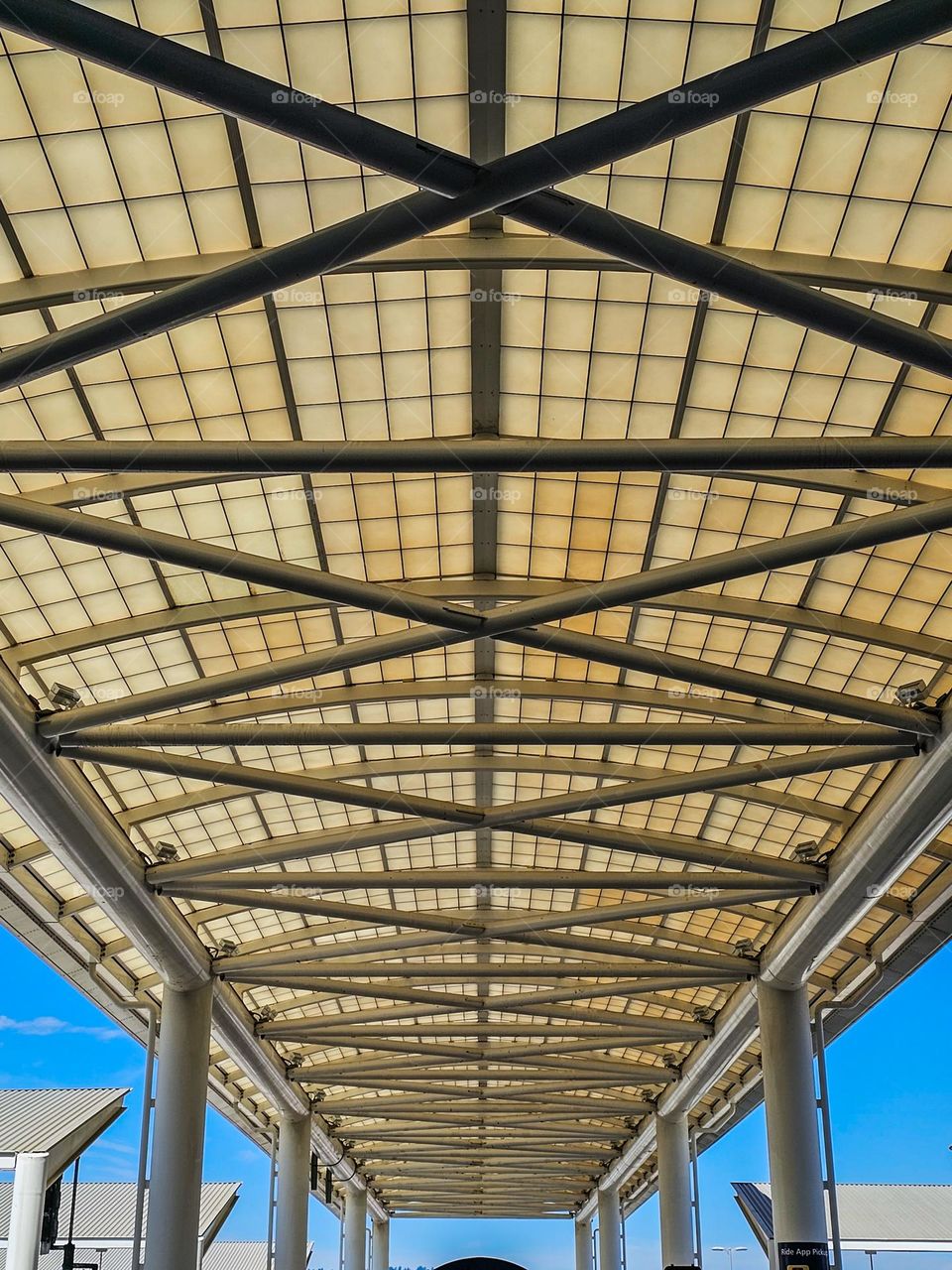 Architectural overhang outside of Oakland International Airport curbside in Oakland California 