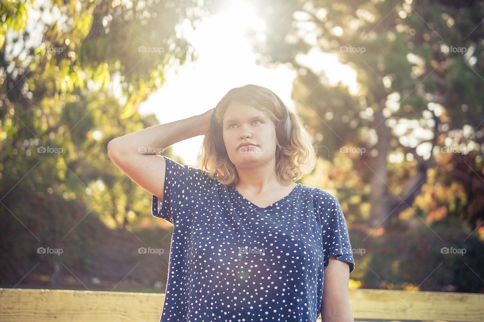 girl in polka dot t-shirt on the summer morning