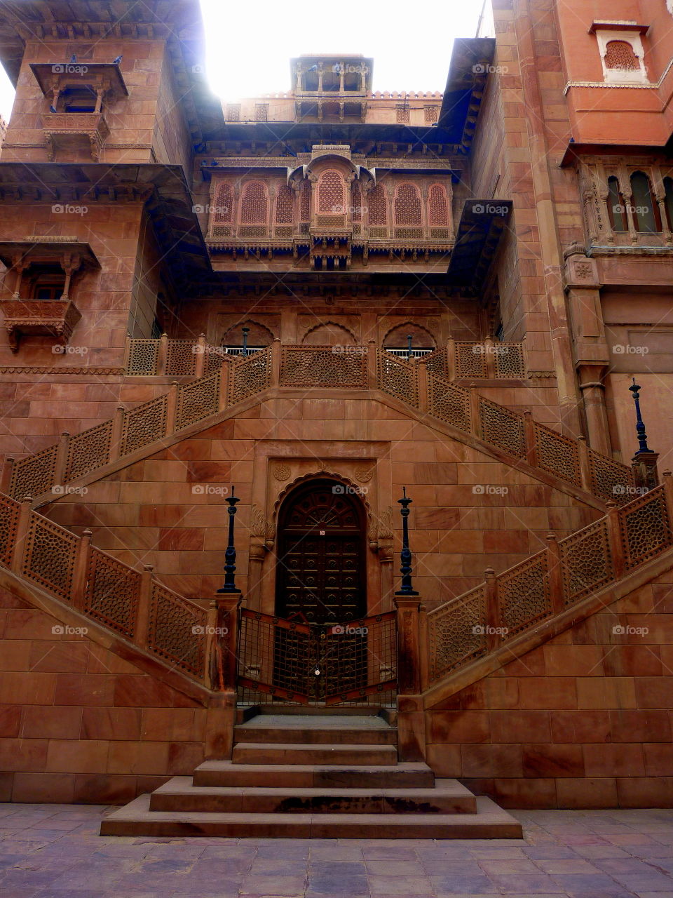 indian palace with external stairs from the courtyard