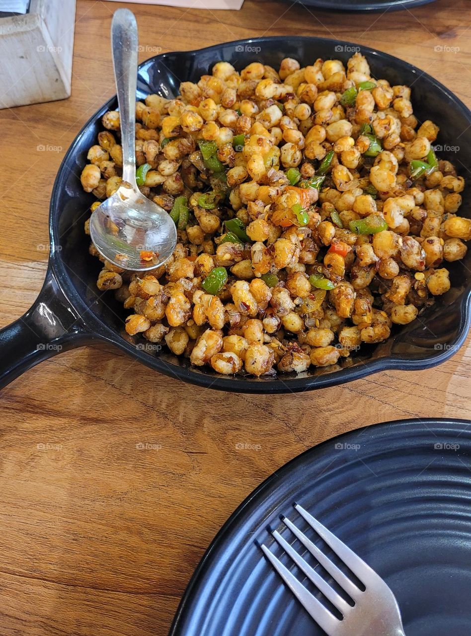 crispy corn starter at a restaurant in indore india