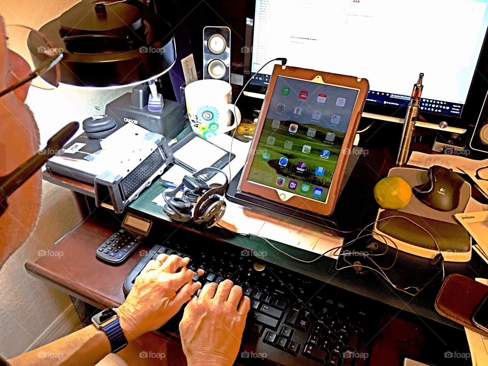 Man surrounded by technology 