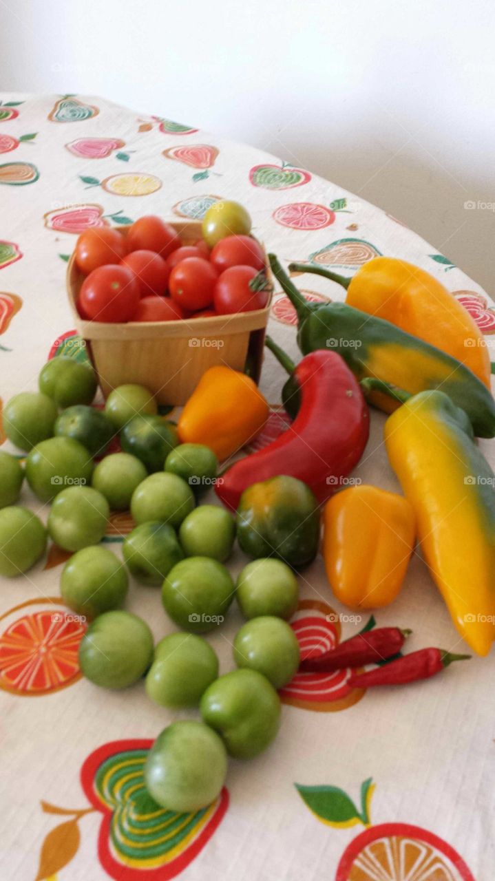 organic tomatos sweet and hot peppers