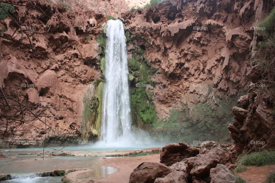 Hidden deep in the Grand Canyon you'll find beautiful waterfalls such as this that are part of the Colorado River