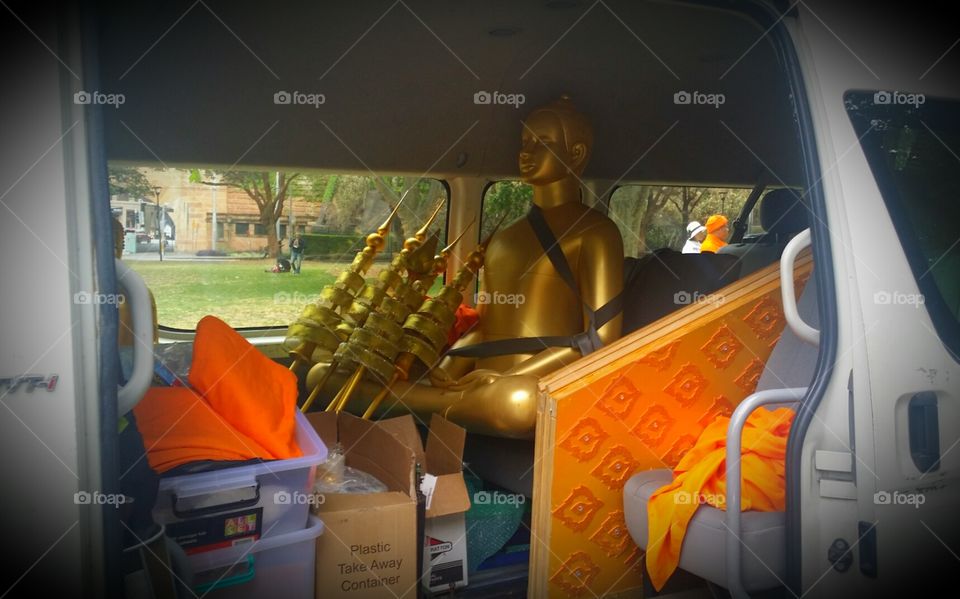 Gold Buddha statue in the van