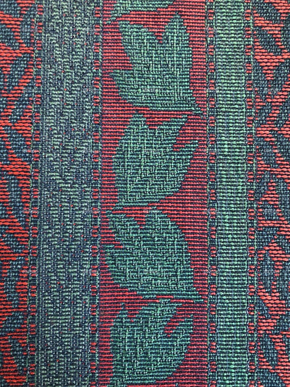 Old fabric on a streetcar seat sees new life when it is wholly showcased as the beautiful pattern it is.