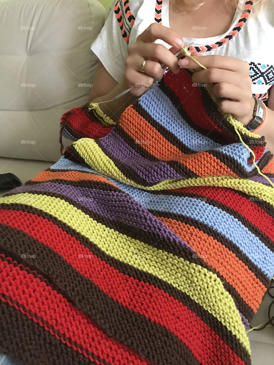 Knitting a bright blanket