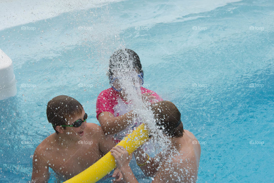 having a great time at the pool