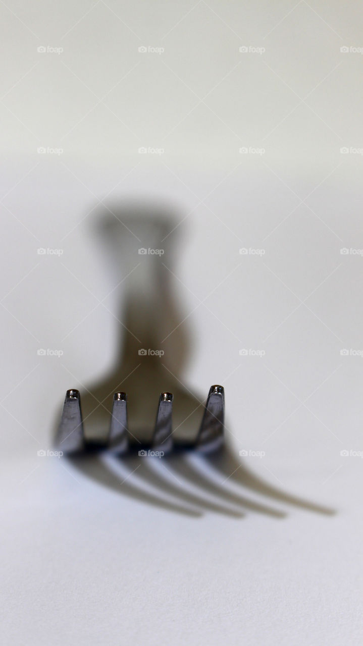 this is just a fork that I take with a macro objective in my camera I put the light on the left so I have an effect very interesting