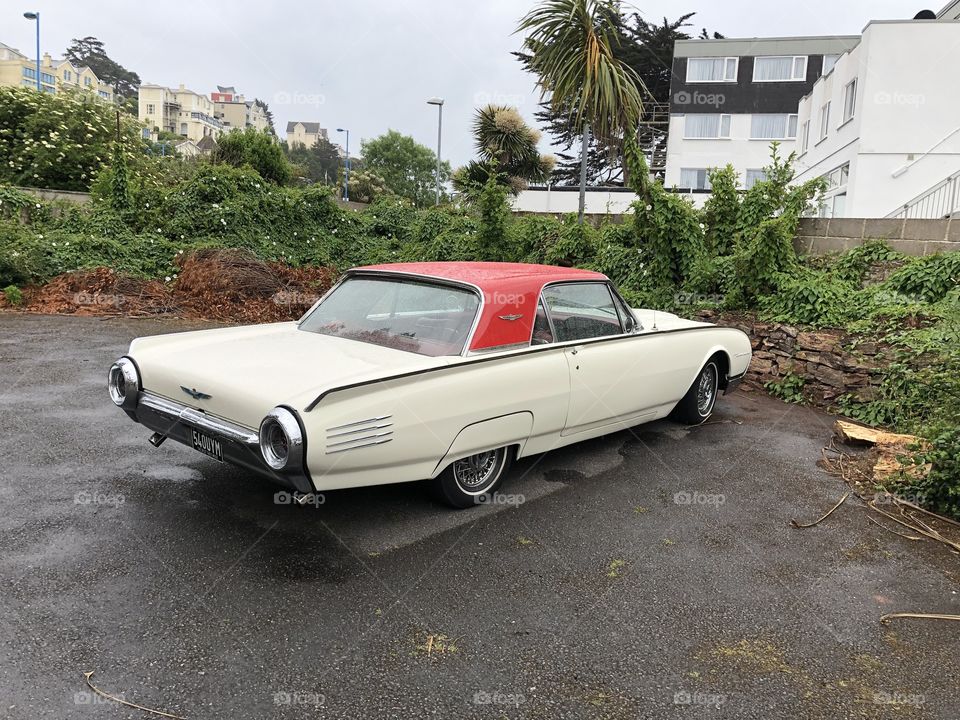 Spotted this rather smart cream and pink car, from foreign shores, l am not sure how old it is?