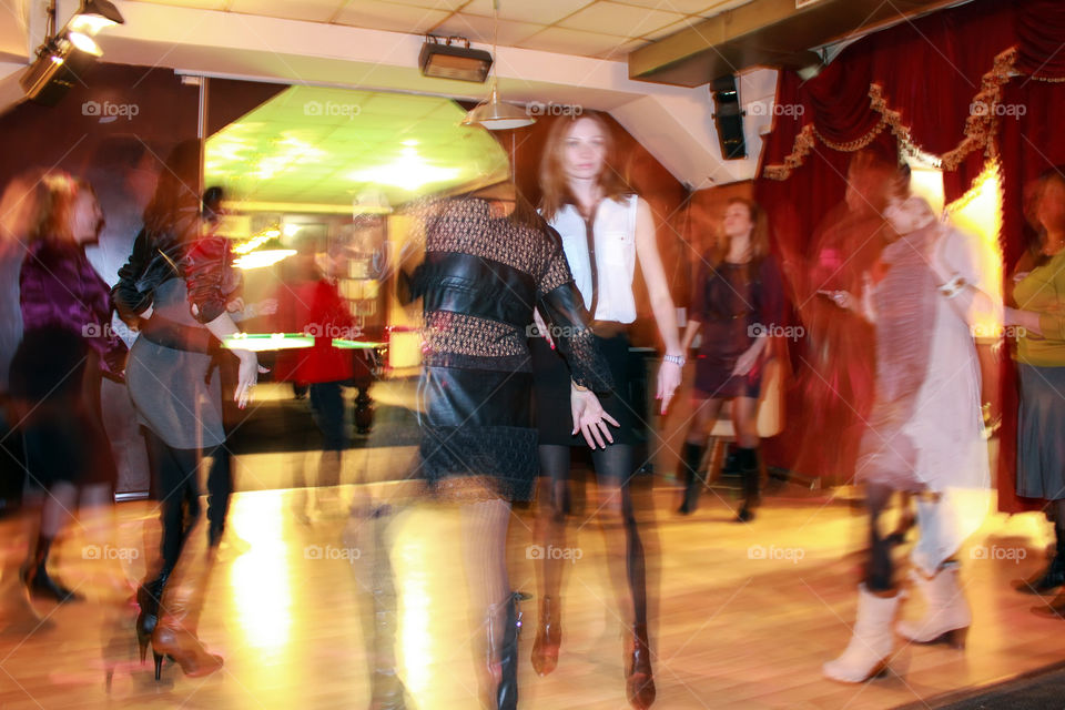 Dancers at the dance floor blur