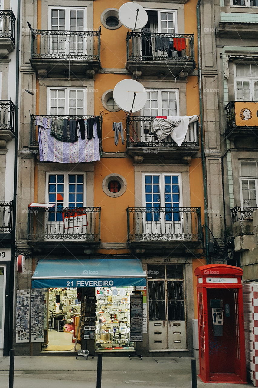 typical old Porto street with hanging clothes, Portugal