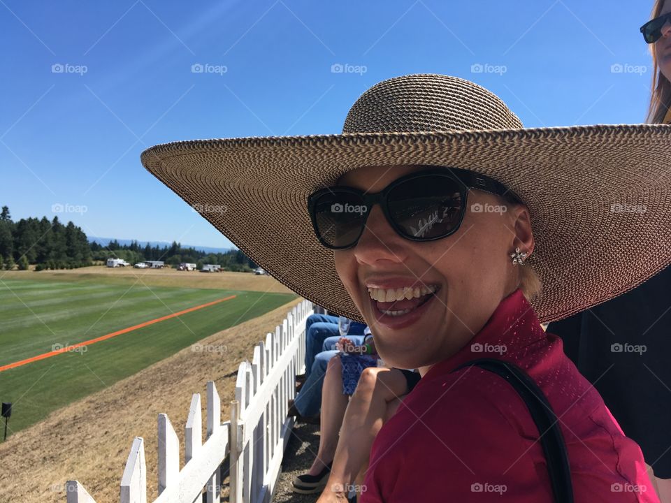 A woman at a Polo Game. 