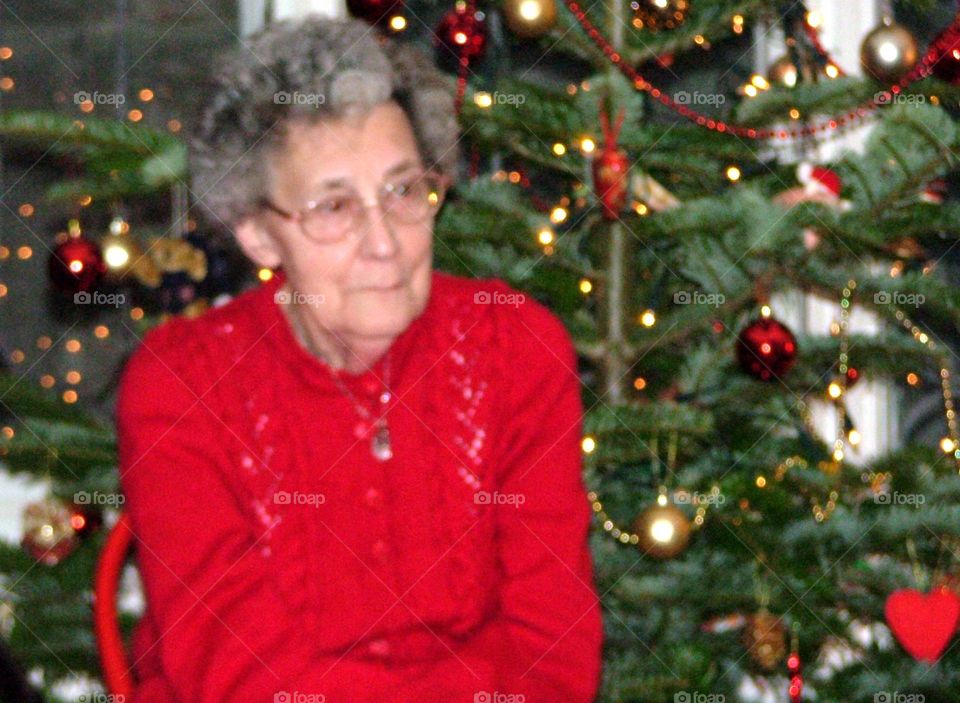 Mum by the Christmas tree 