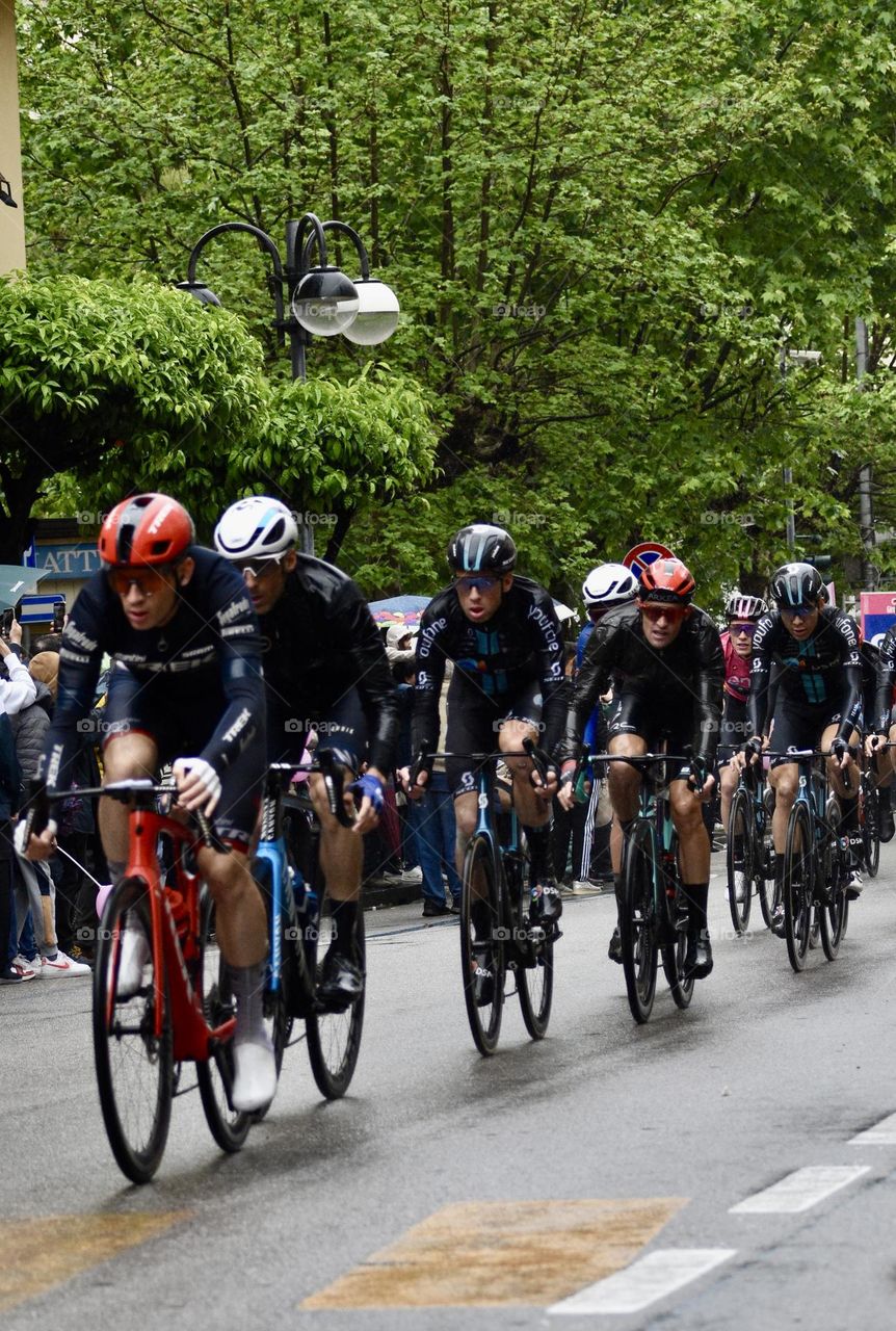 people ride bicycles in the city