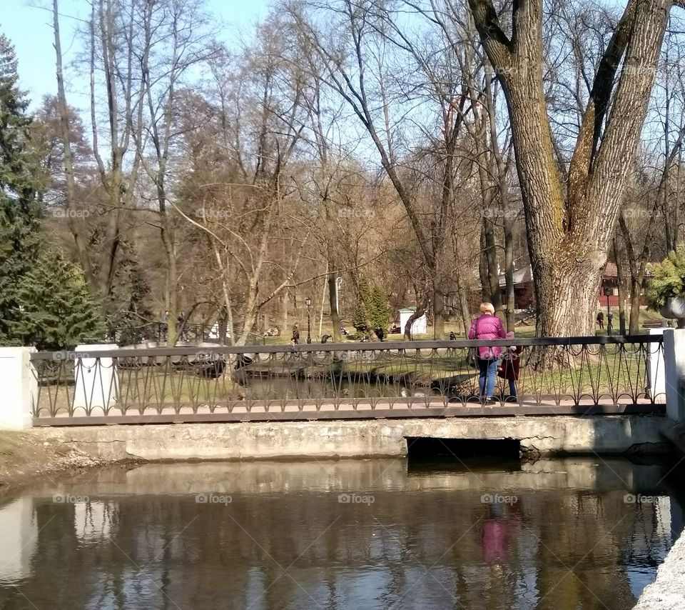 city park and river shore and family